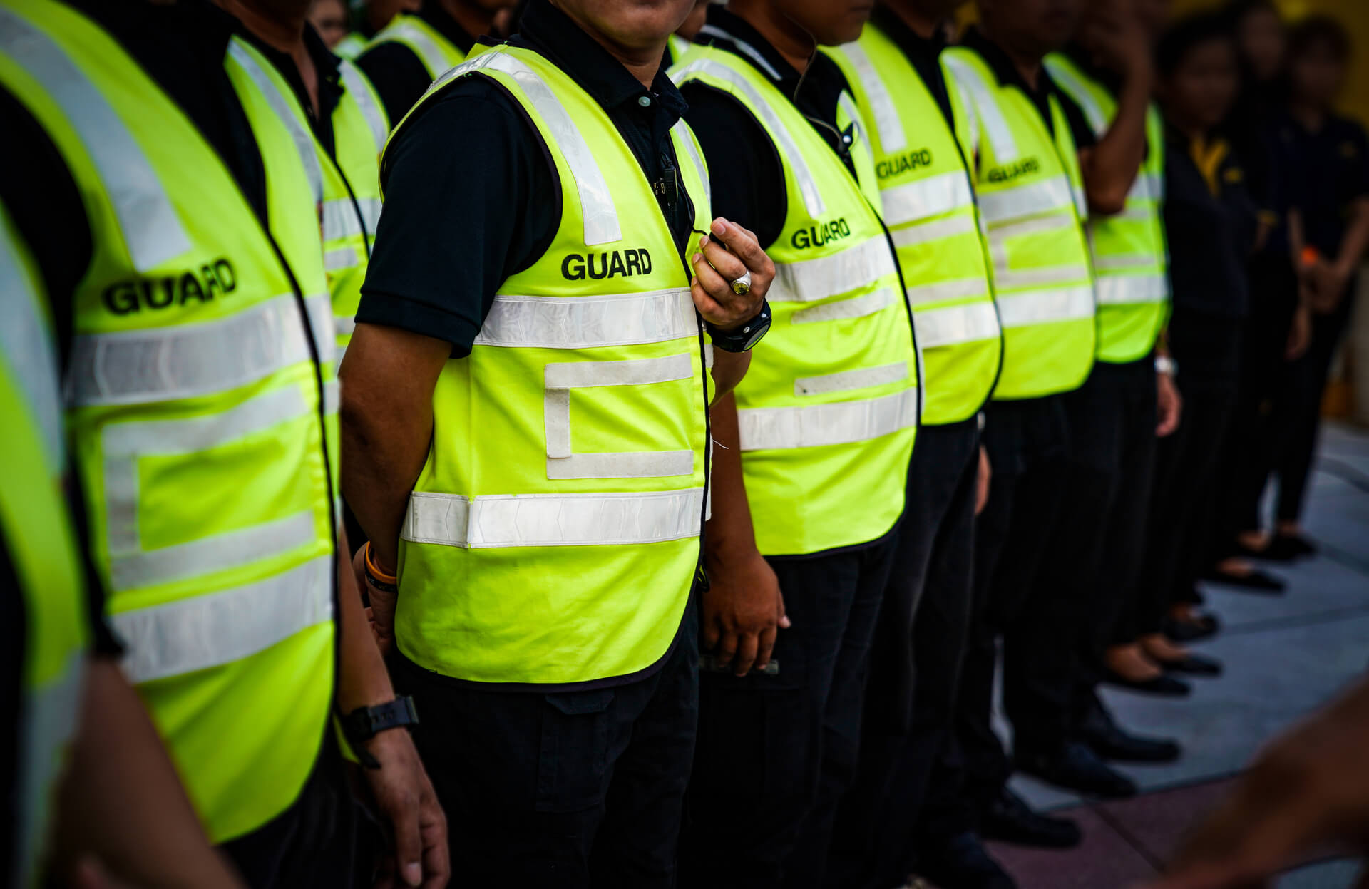 medium-asian-securities-and-guards-are-stadning-in-the-row-meeting-and-waiting-for-order-from-commander-in-thailand-concert-event