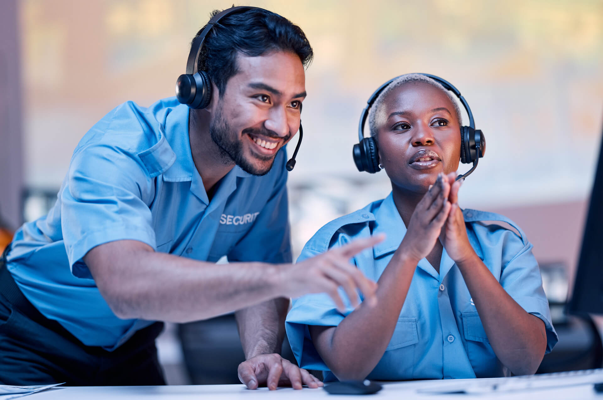 medium-vecteezy_security-surveillance-and-a-man-training-a-black-woman-in-a_75983729_medium
